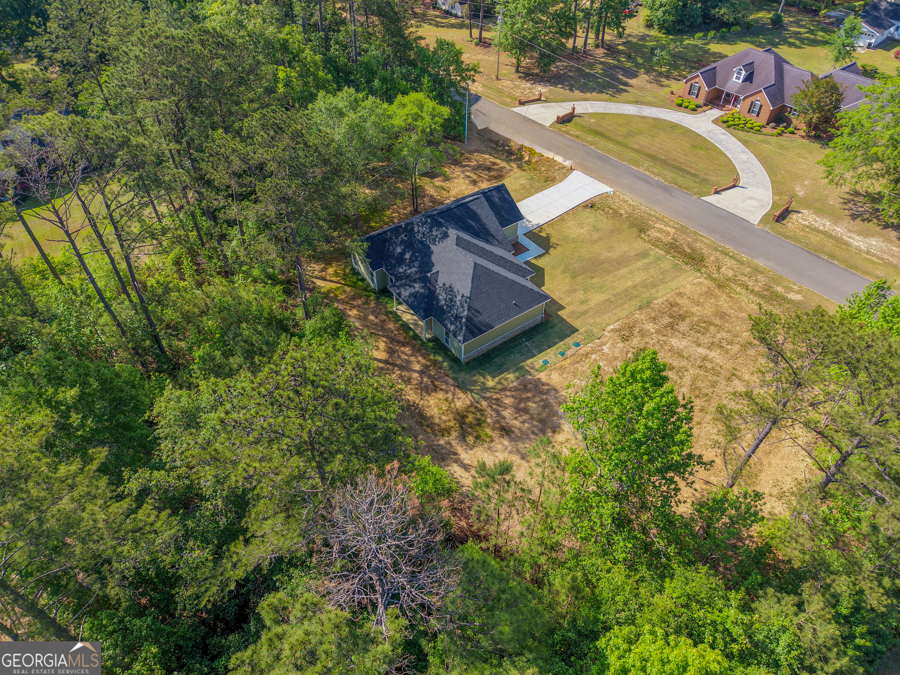 711 Flanders Lane Dublin, GA 31021 - Photo 42 of 49 a view of a house with a yard and sitting area