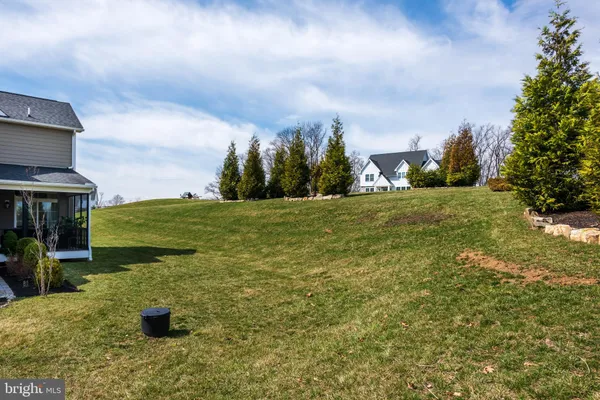 a view of a swimming pool with a mountain