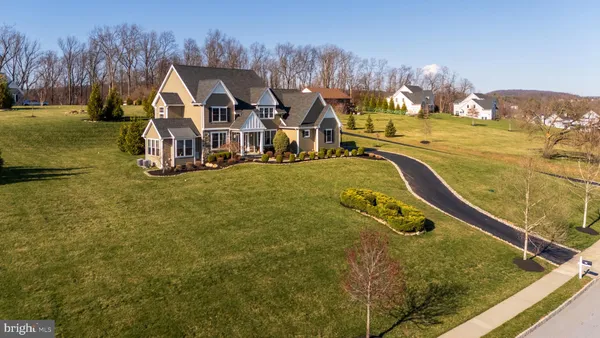 a picture of a bench in front of a wall
