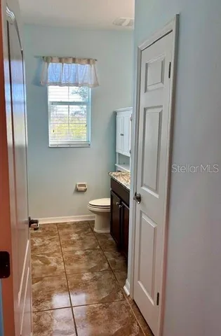 a bathroom with a toilet