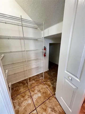 a utility room with cabinets