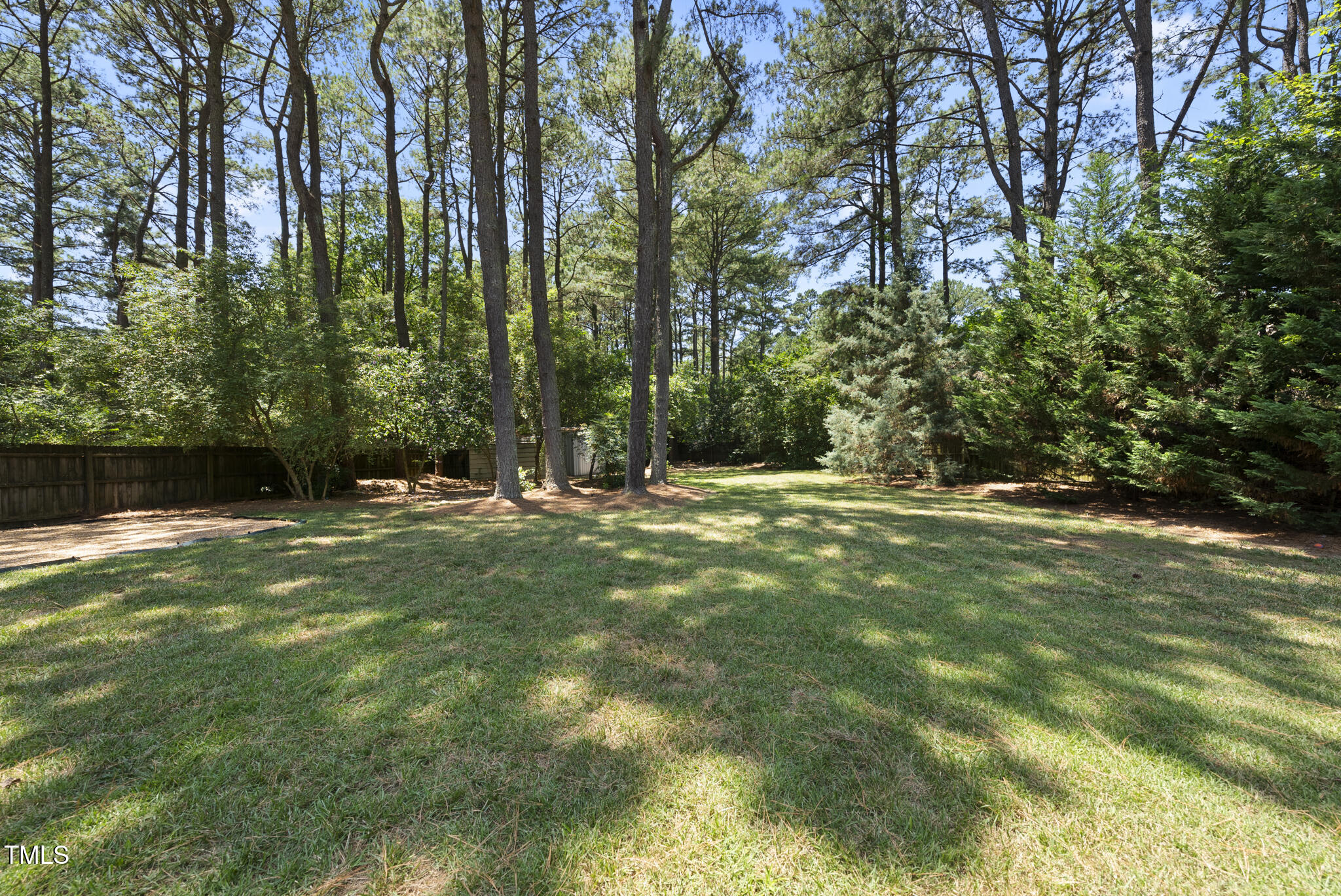 2704 Farnborough Road Raleigh, NC 27613 - Photo 35 of 39 a view of outdoor space with a garden