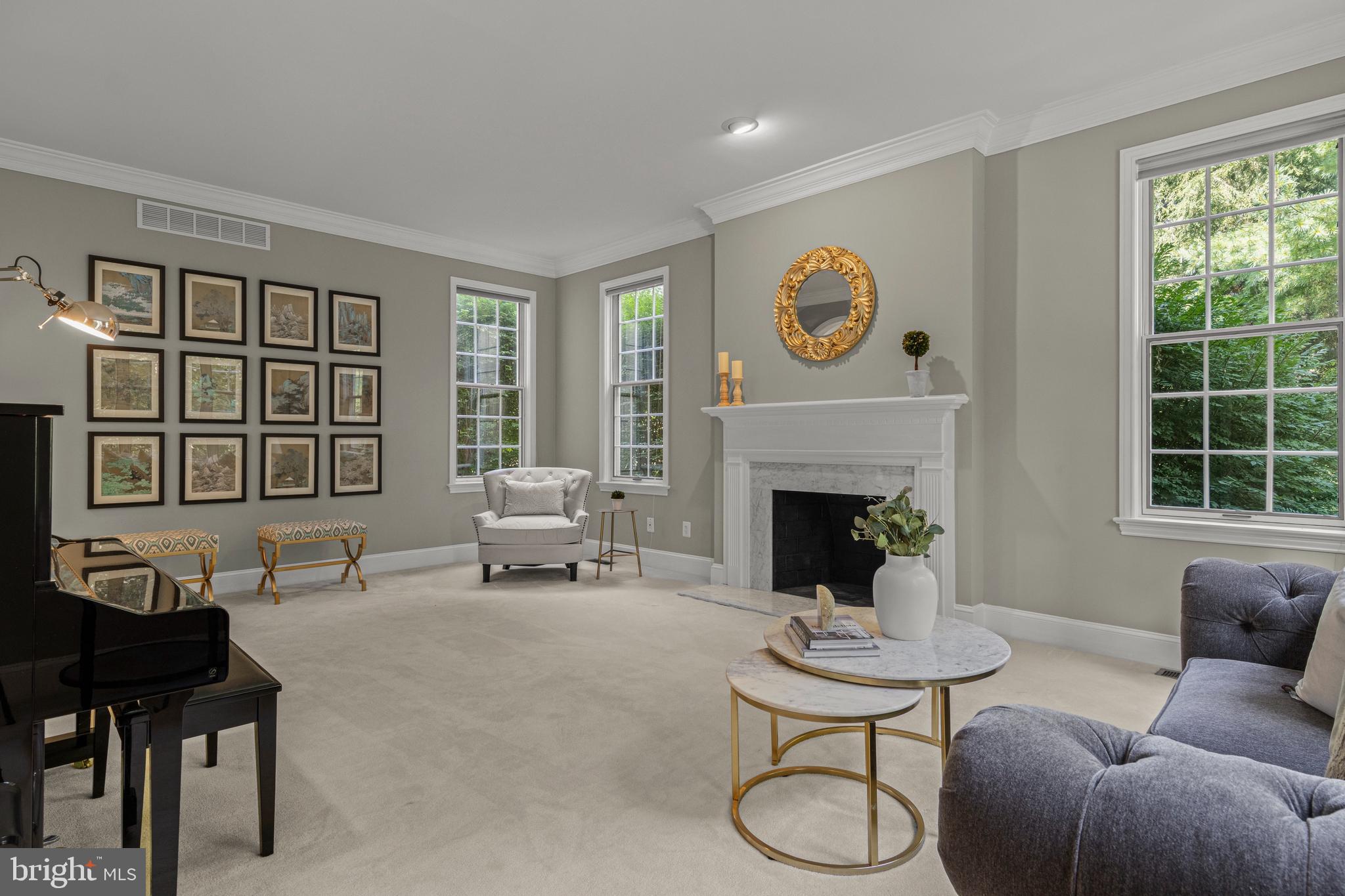1285 Farm Road Berwyn, PA 19312 - Photo 13 of 75 a living room with furniture a fireplace and window