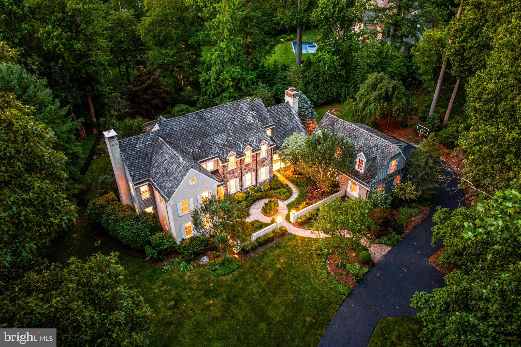 1285 Farm Road Berwyn, PA 19312 - Photo 2 of 75 an aerial view of house with yard swimming pool and outdoor seating