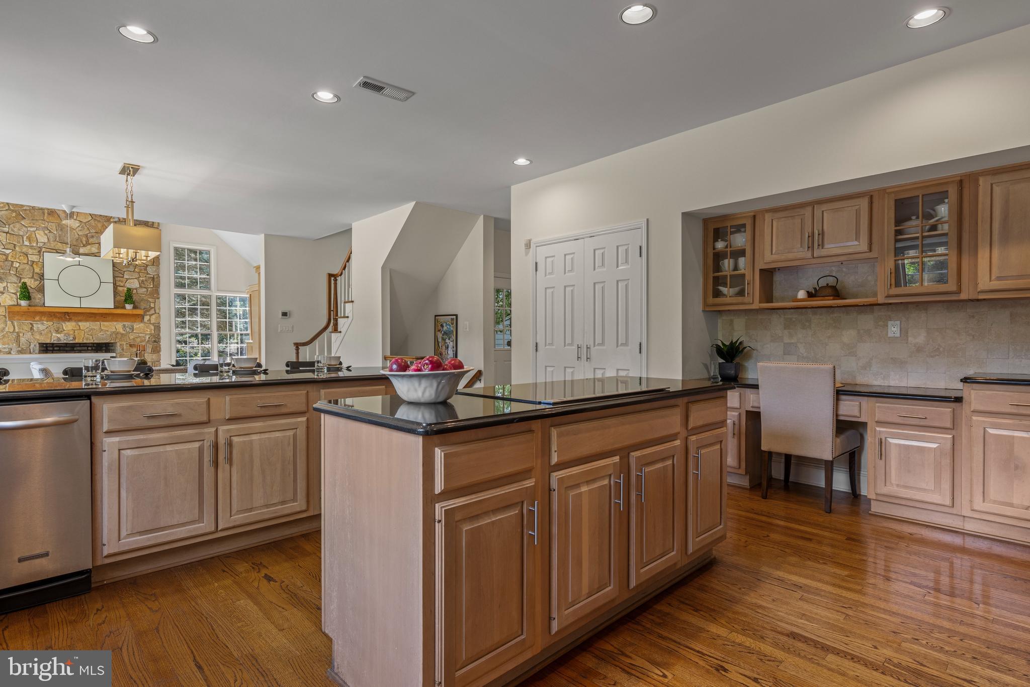1285 Farm Road Berwyn, PA 19312 - Photo 22 of 75 a kitchen with stainless steel appliances granite countertop a sink stove and cabinets
