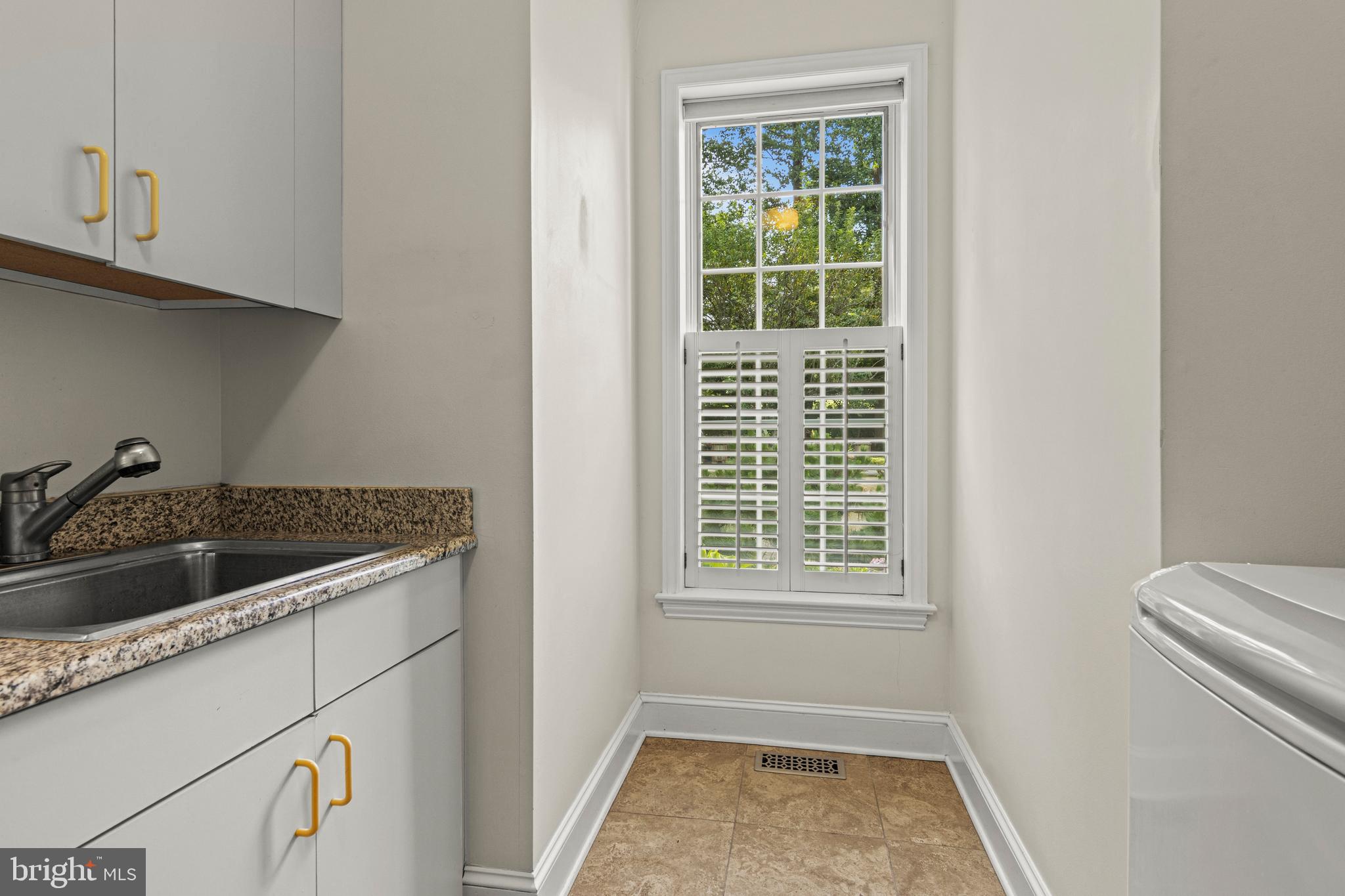 1285 Farm Road Berwyn, PA 19312 - Photo 34 of 75 a kitchen with a sink and cabinets