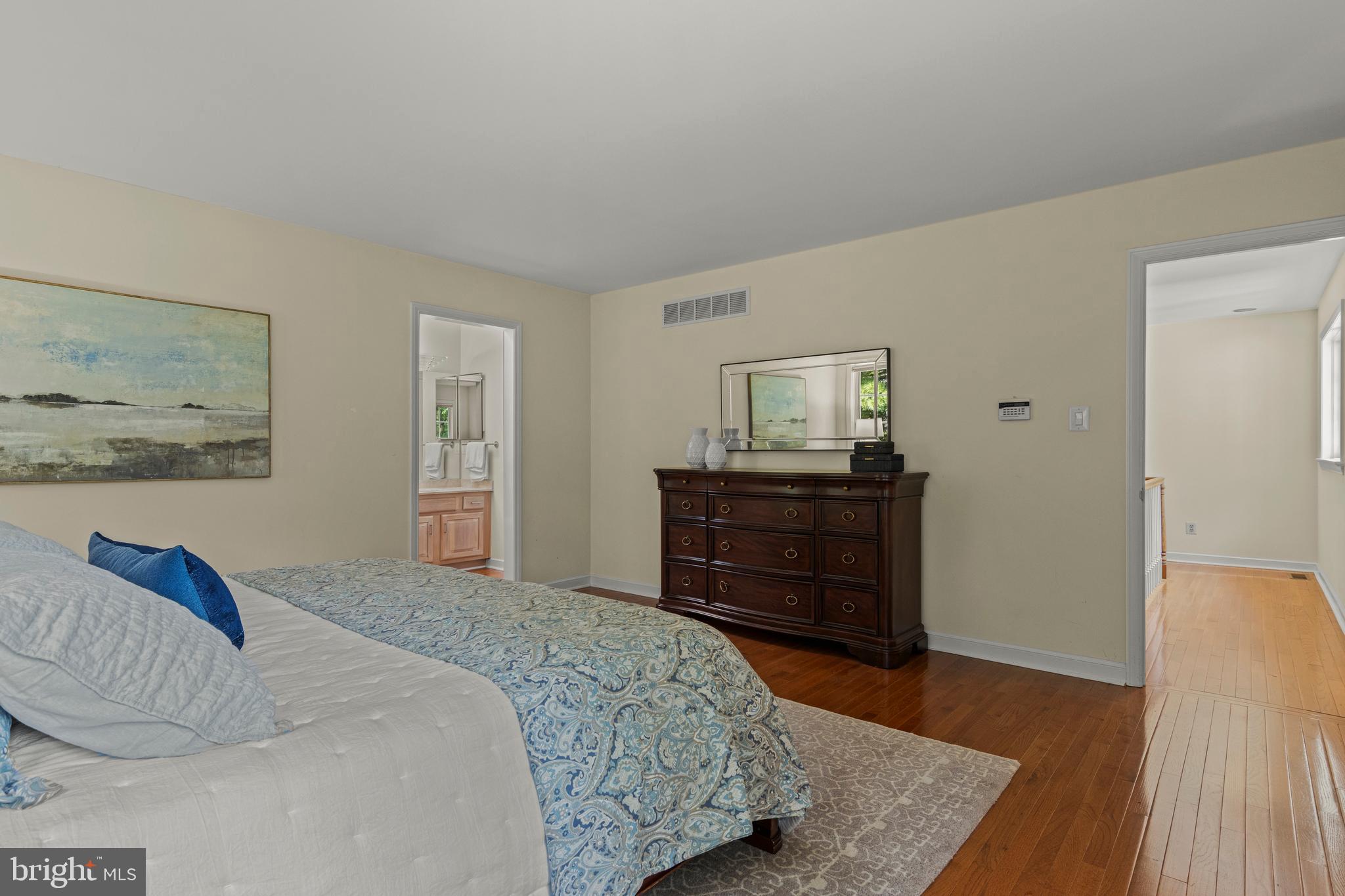 1285 Farm Road Berwyn, PA 19312 - Photo 37 of 75 a bedroom with a bed and wooden floor