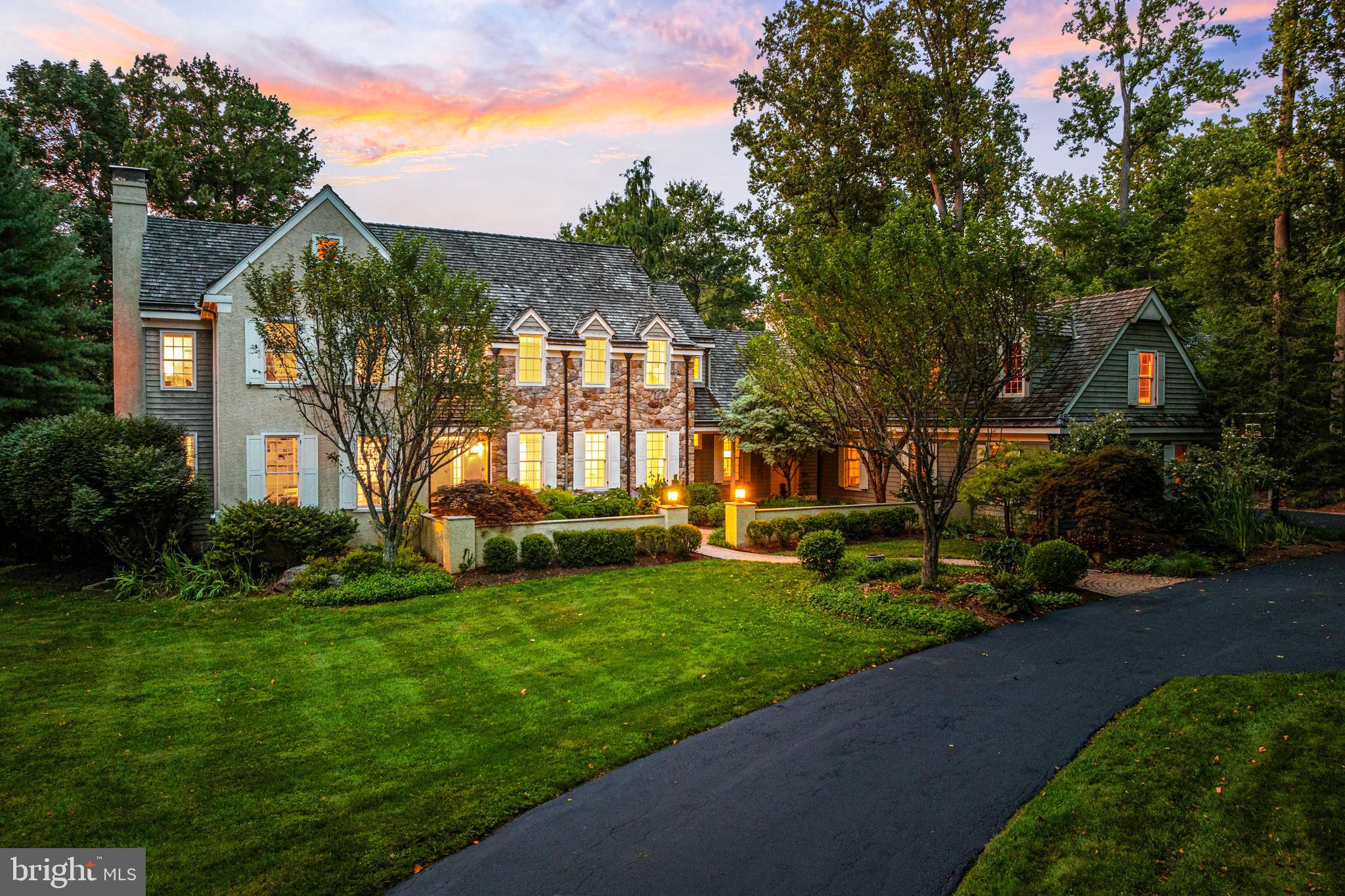 1285 Farm Road Berwyn, PA 19312 - Photo 4 of 75 a view of a house with a big yard and potted plants