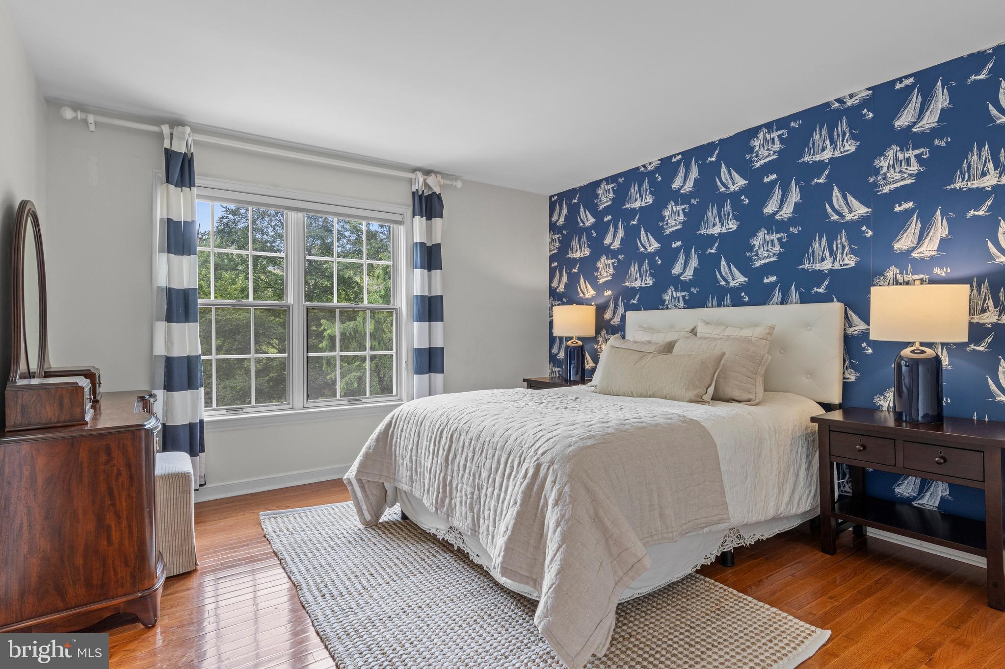 1285 Farm Road Berwyn, PA 19312 - Photo 45 of 75 a bedroom with a bed and wooden floor