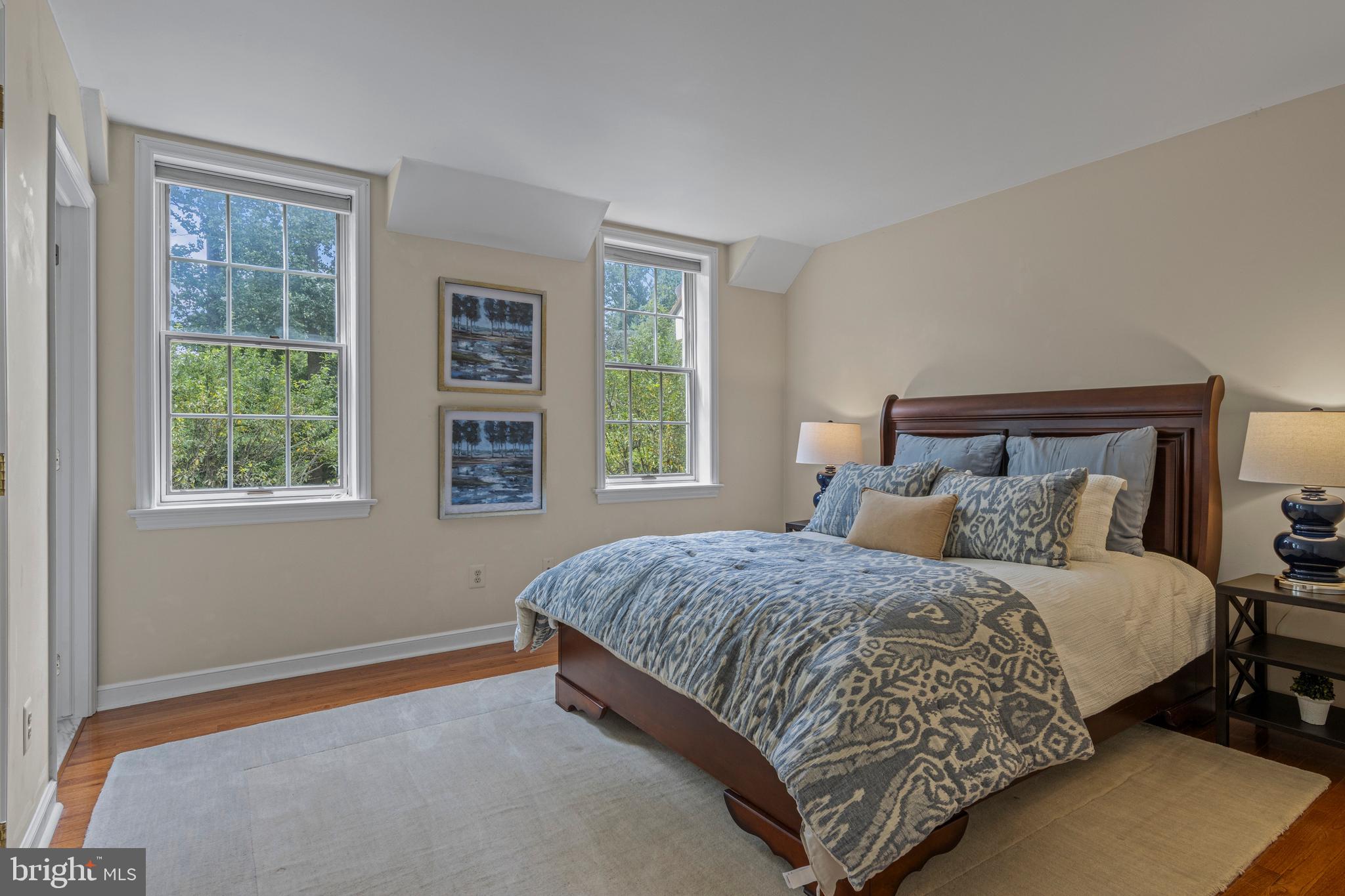 1285 Farm Road Berwyn, PA 19312 - Photo 46 of 75 a bedroom with a bed lamp and a window