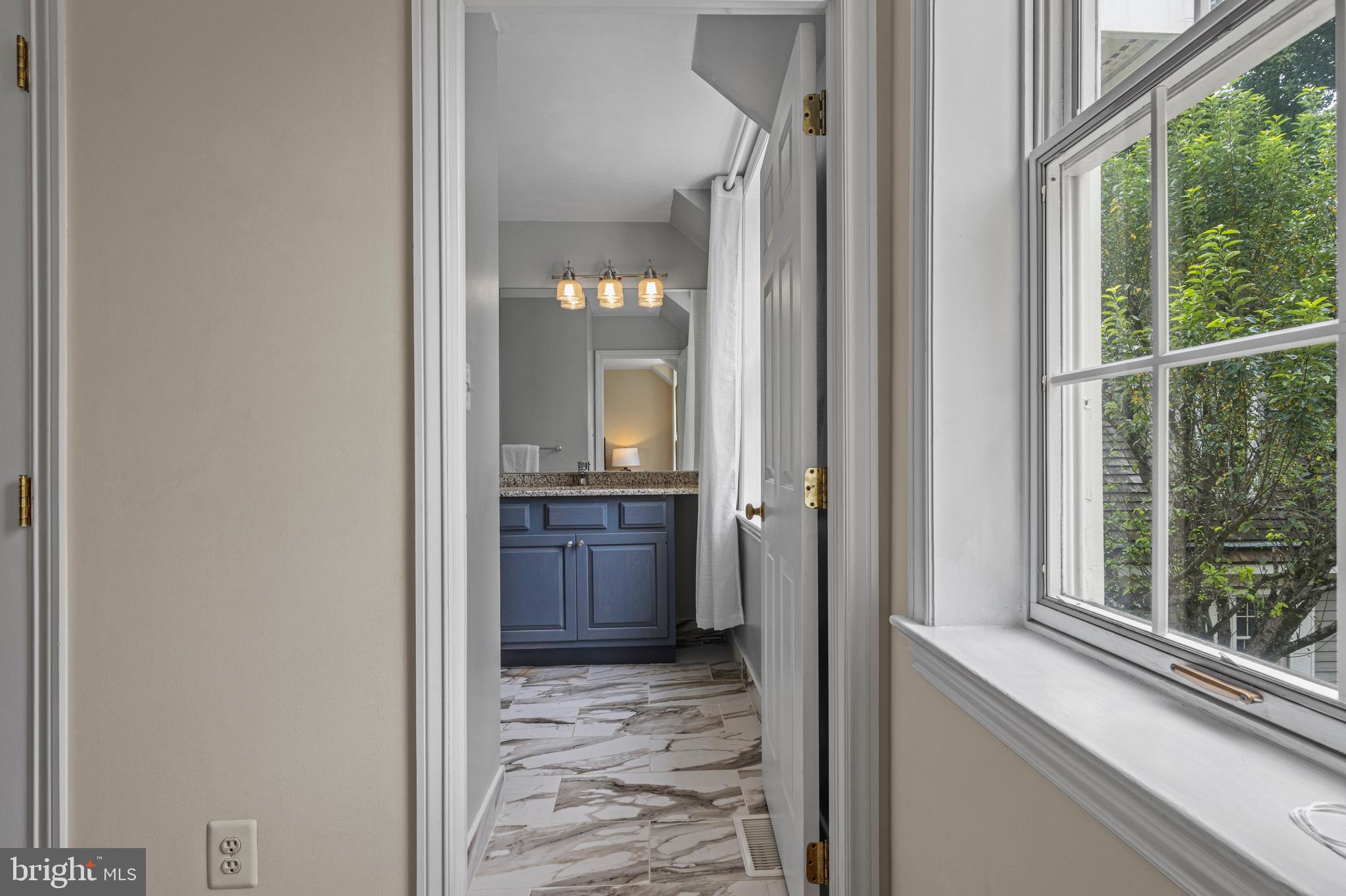 1285 Farm Road Berwyn, PA 19312 - Photo 47 of 75 a view of a bathroom from a hallway