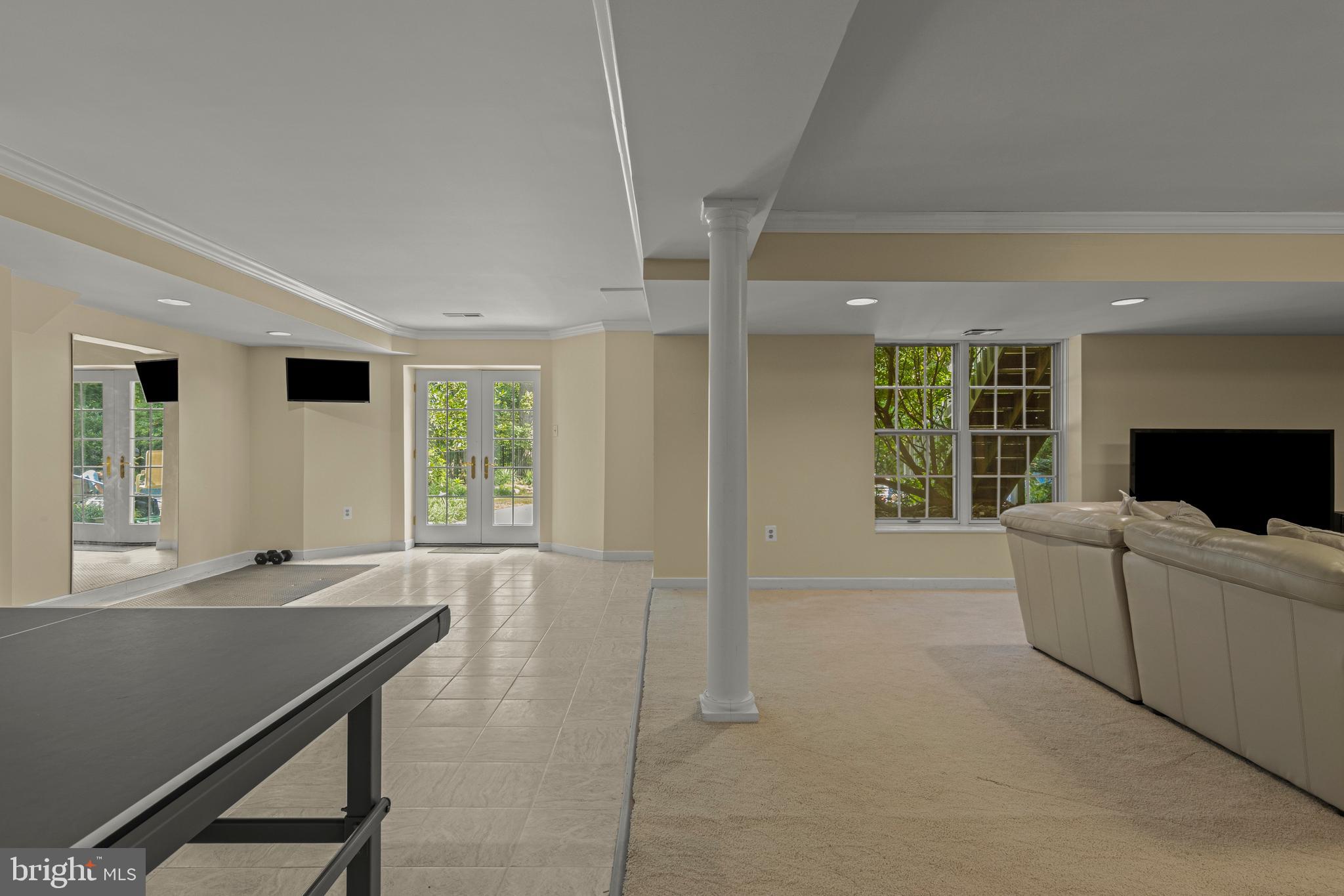 1285 Farm Road Berwyn, PA 19312 - Photo 52 of 75 a living room with furniture and a flat screen tv