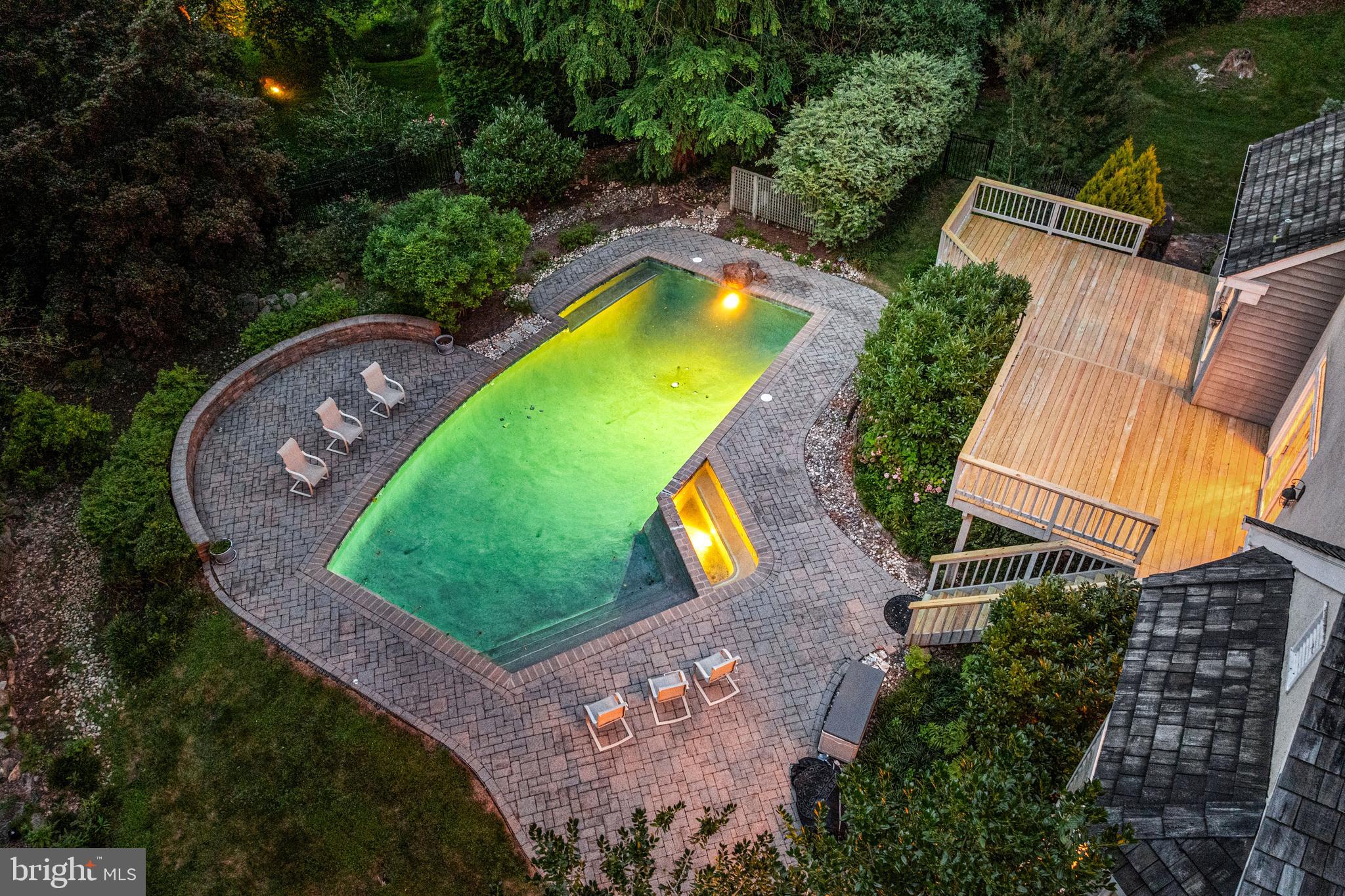 1285 Farm Road Berwyn, PA 19312 - Photo 62 of 75 an aerial view of a house with a swimming pool