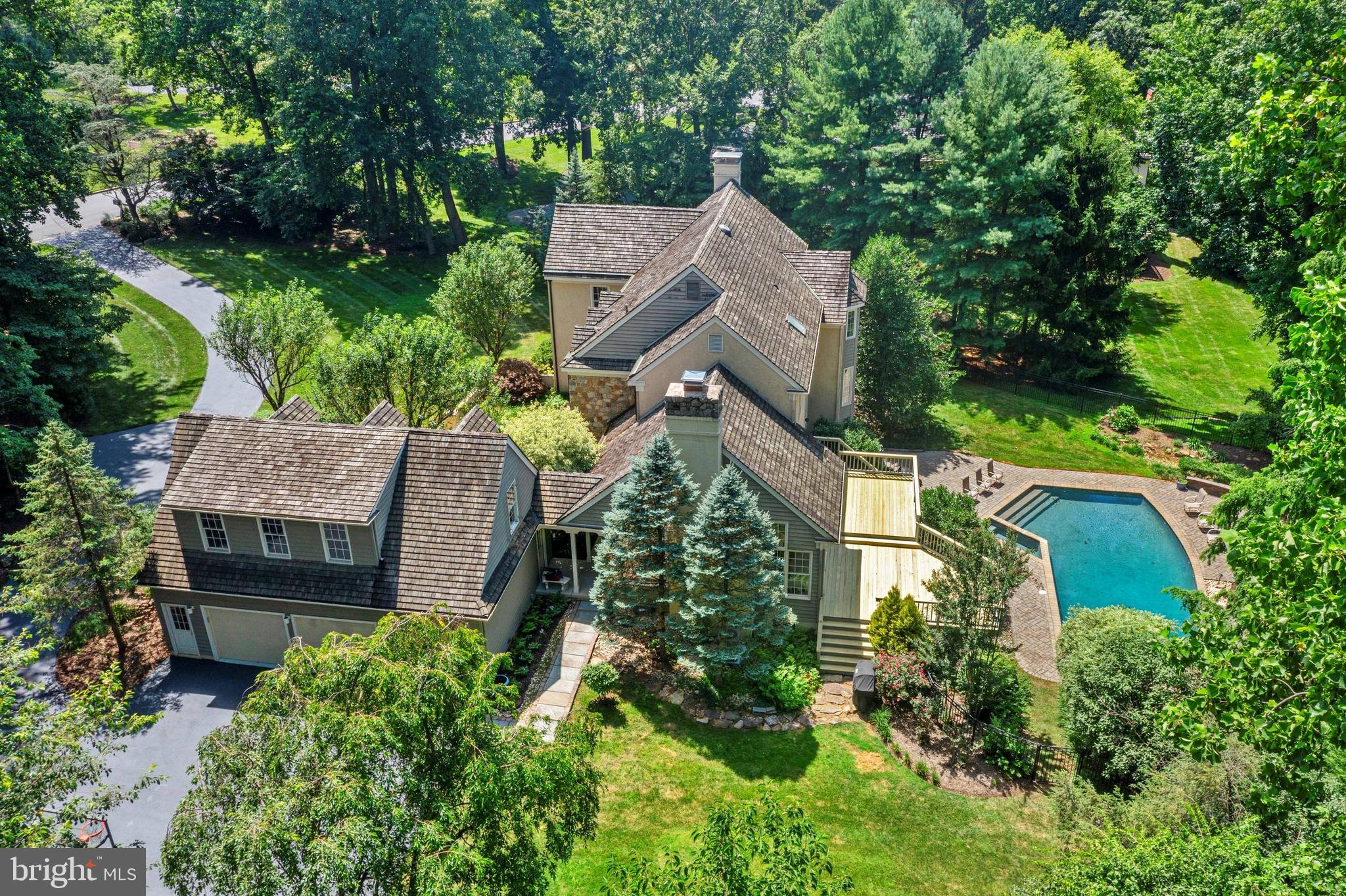 1285 Farm Road Berwyn, PA 19312 - Photo 67 of 75 aerial view of home, garage, pool, yard
