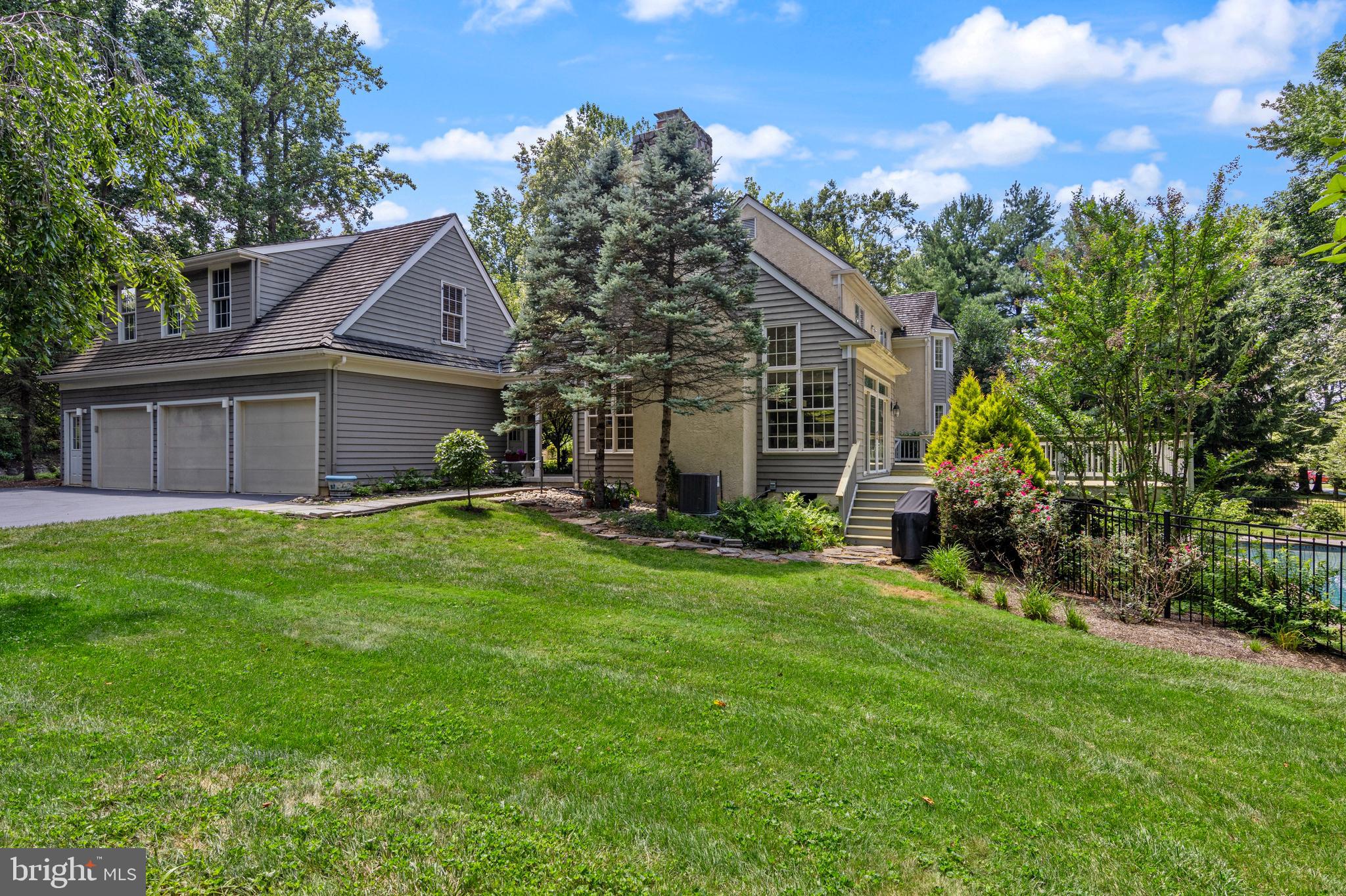 1285 Farm Road Berwyn, PA 19312 - Photo 68 of 75 a view of a house with a big yard plants and large trees
