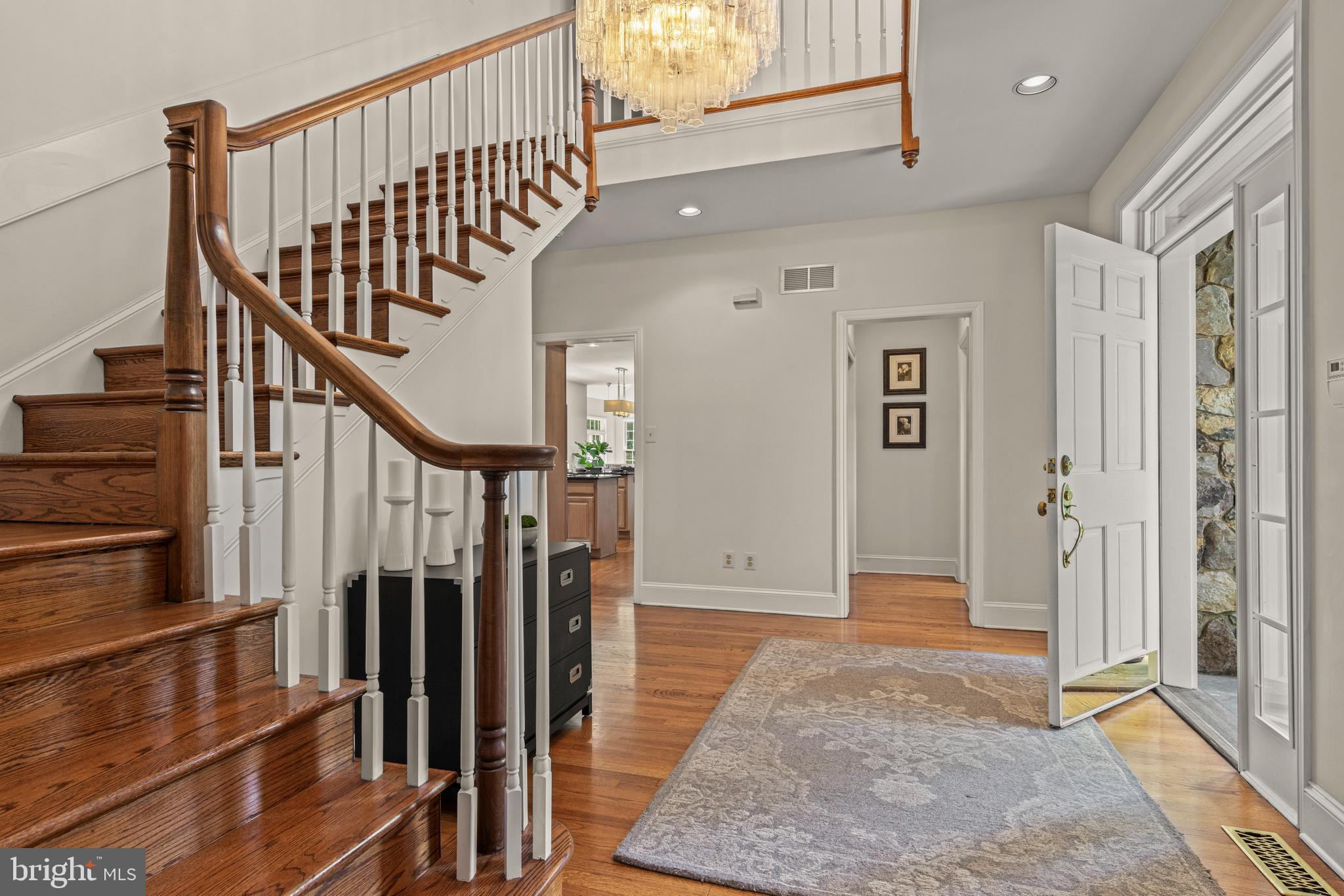 1285 Farm Road Berwyn, PA 19312 - Photo 10 of 75 a view of entryway with wooden floor and stairs