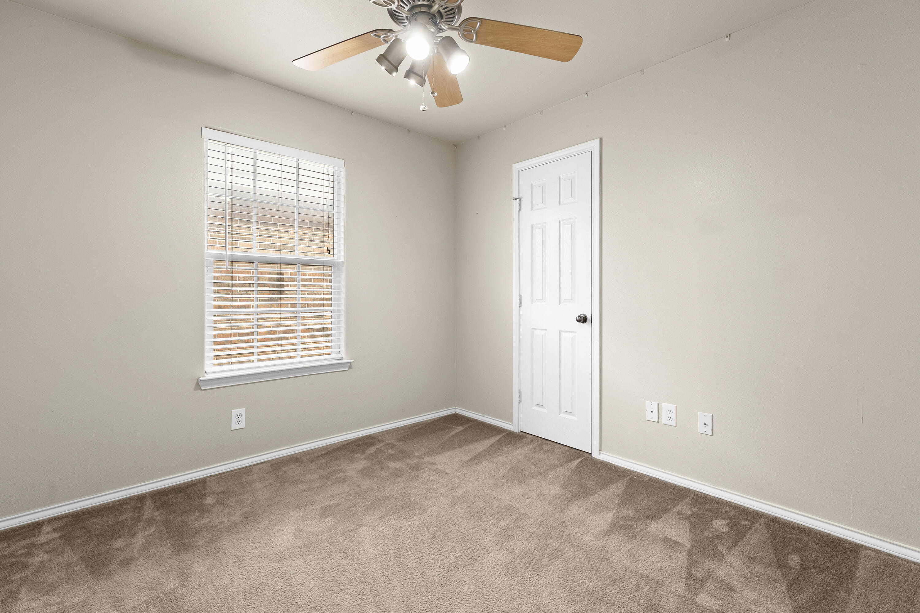 6522 93rd Street Lubbock, TX 79424 - Photo 17 of 22 an empty room with a window