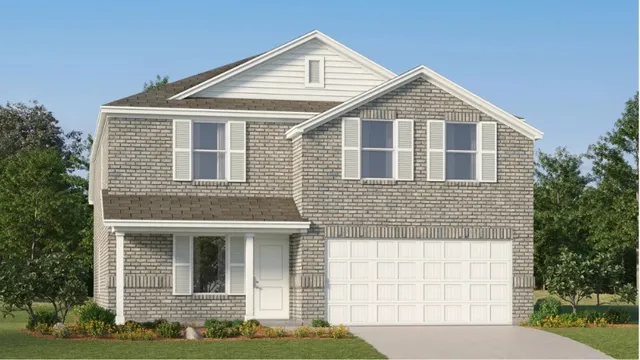 a front view of a house with yard