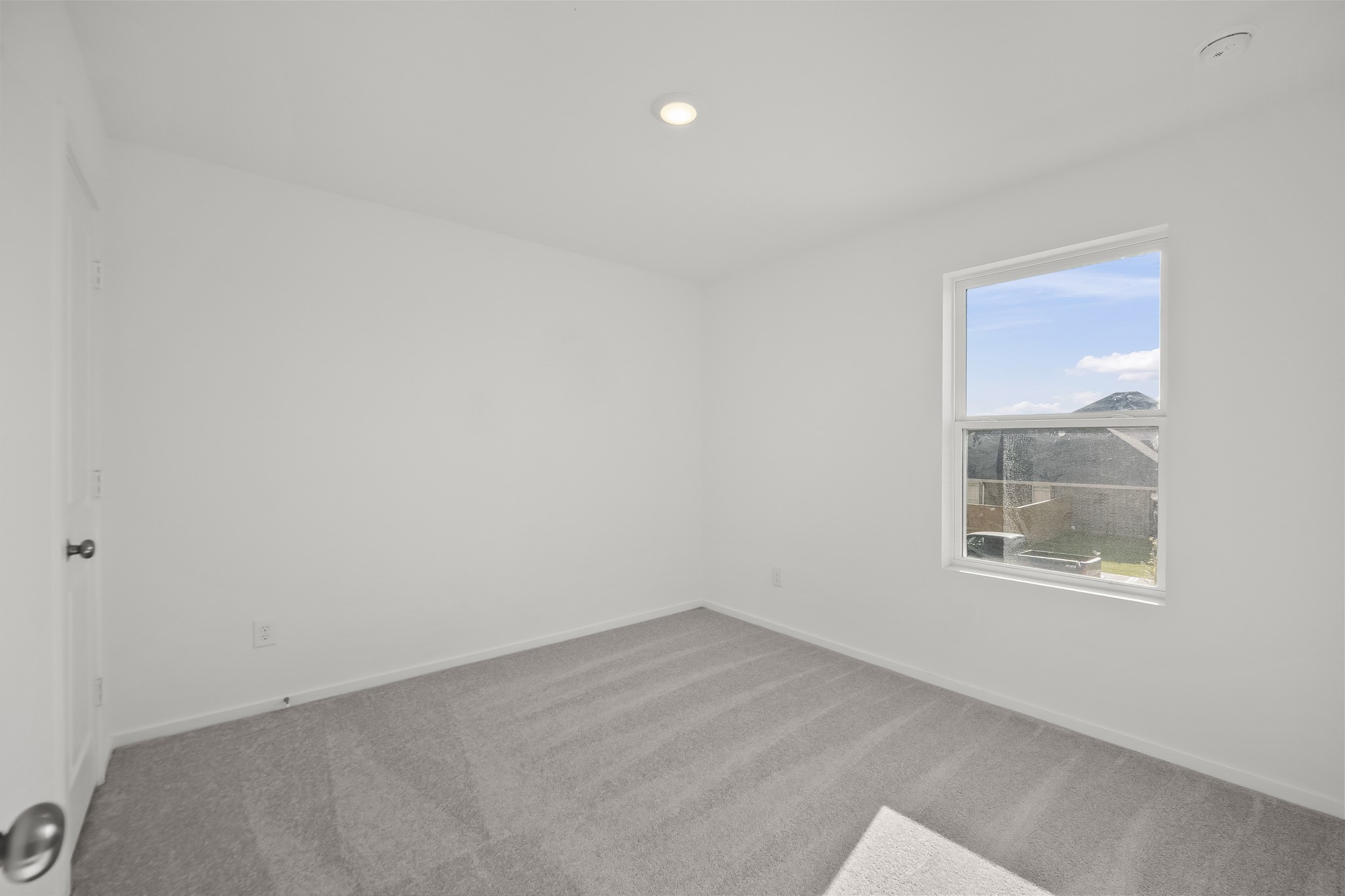 2115 Mosaic Vly Court Angleton, TX 77515 - Photo 13 of 16 an empty room with a window