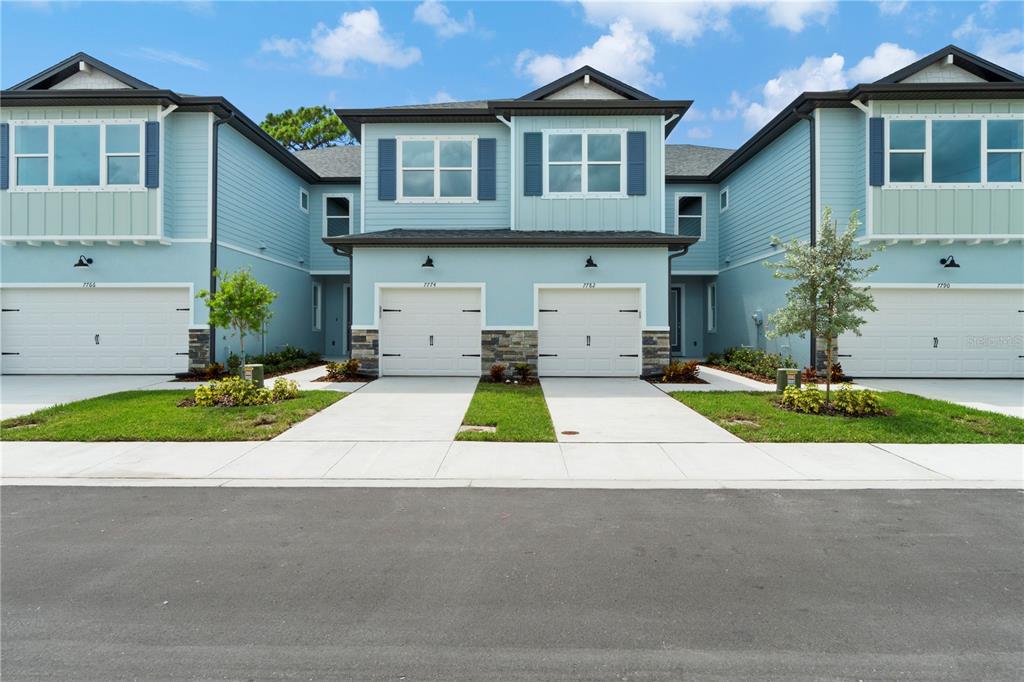 7734 93rd Street North Seminole, FL 33777 - Photo 1 of 26 a view of outdoor space yard and front view of a house