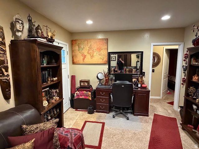 737 Wasatch Street Midvale, UT 84047 - Photo 15 of 29 Dedicated workspace featuring a dark wood-finish desk with storage drawers and a black framed mirror