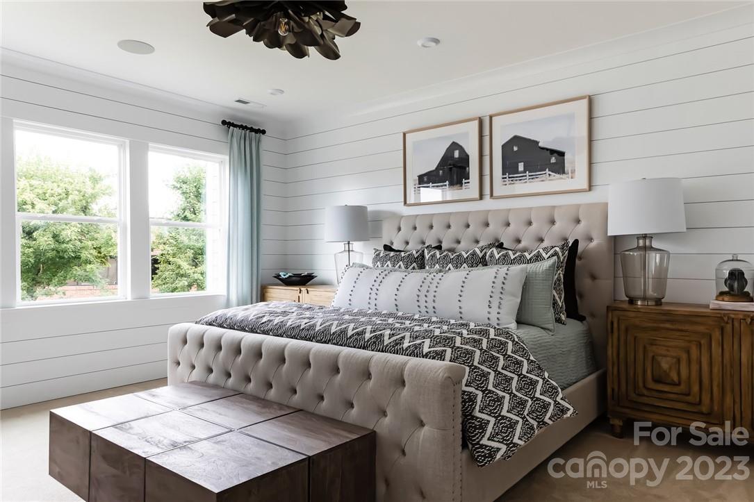 216 Brooks Springs Drive Fort Mill, SC 29708 - Photo 14 of 24 a bed sitting in a bedroom next to a window with a dresser