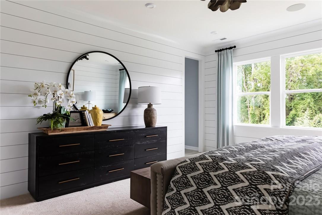 216 Brooks Springs Drive Fort Mill, SC 29708 - Photo 15 of 24 a bedroom with a bed and a dresser