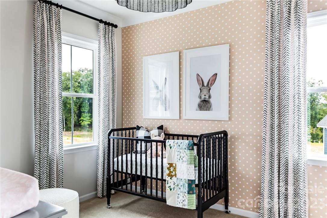 216 Brooks Springs Drive Fort Mill, SC 29708 - Photo 22 of 24 a view of a room that has a bed and a window