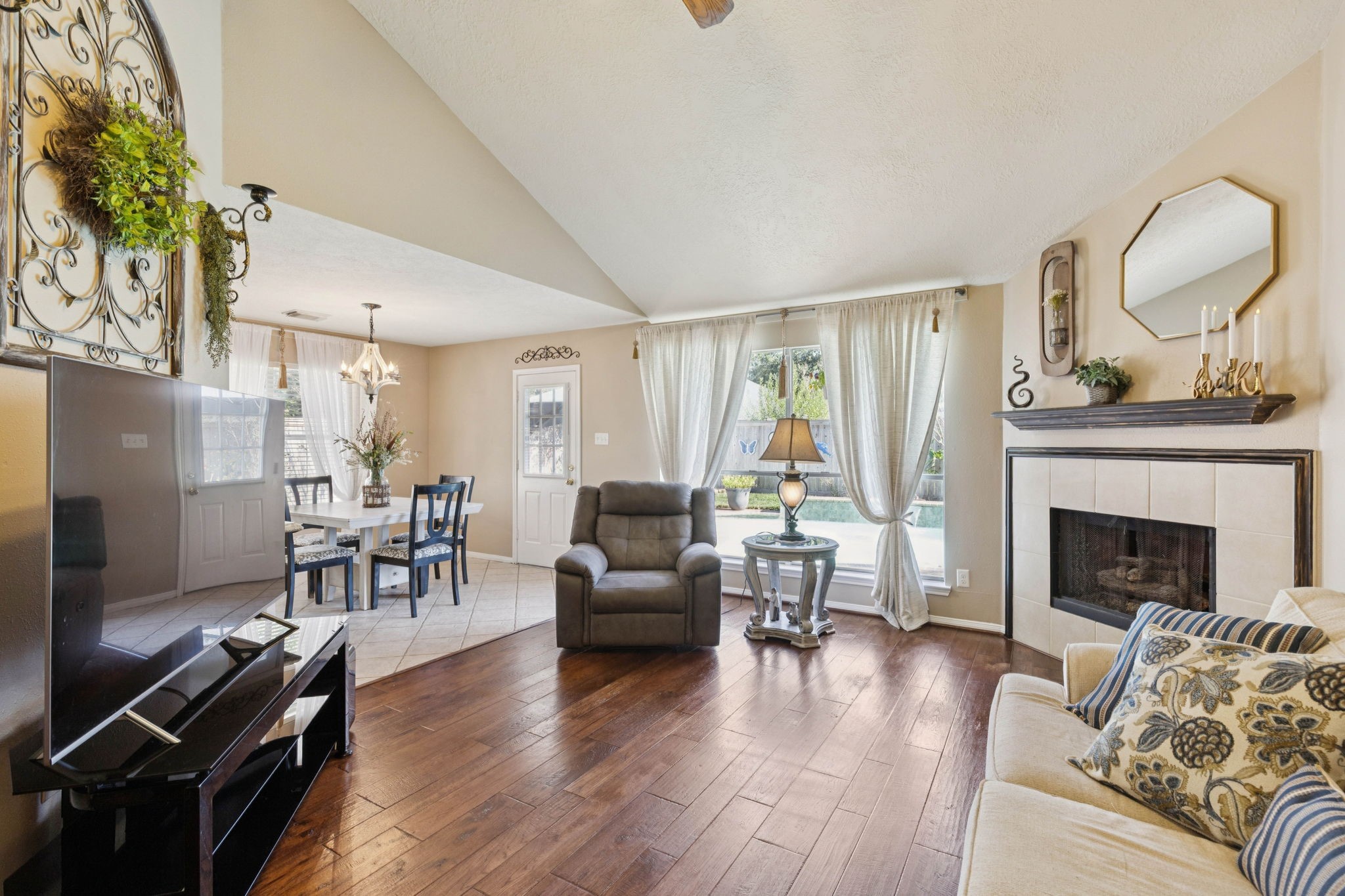 16322 Mango Ridge Court Humble, TX 77396 - Photo 9 of 20 a living room with furniture or fireplace and a wooden floor
