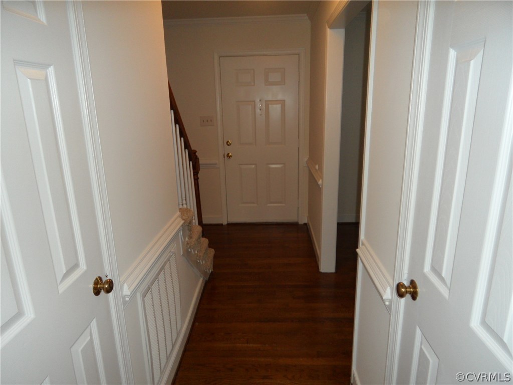 702 Fennimore Road Midlothian, VA 23114 - Photo 2 of 26 a view of a hallway with a white walls and stairs