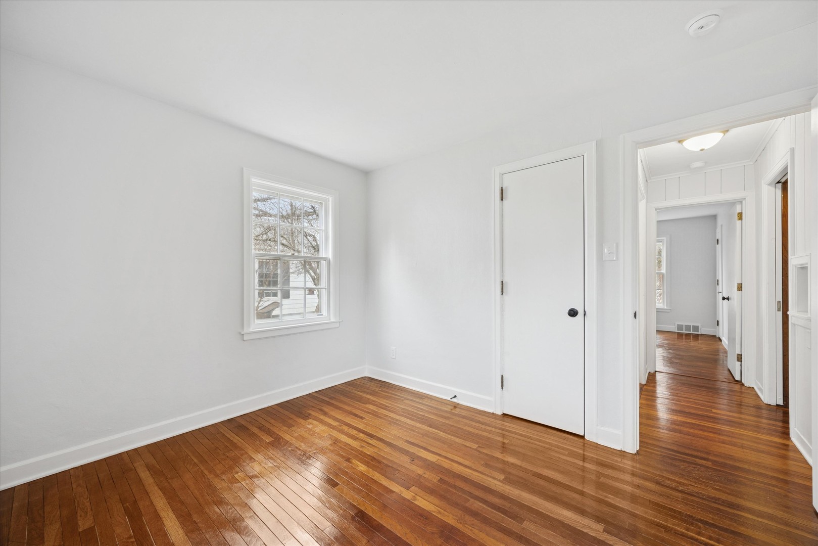 575 South Wall Street Kankakee, IL 60901 - Photo 15 of 28 a view of a room with wooden floor and window