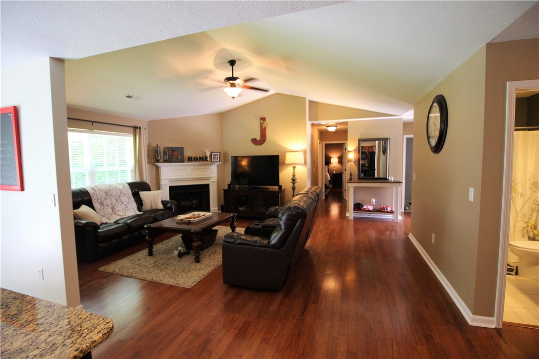 129 Duraleigh Road Anderson, SC 29621 - Photo 3 of 21 Great Room w/gas logs, vaulted ceiling, and hardwo