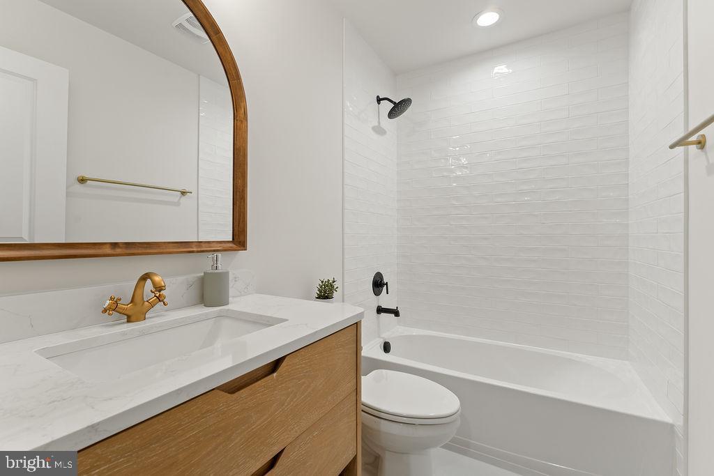1339 Moody Town Road Bumpass, VA 23024 - Photo 26 of 63 a bathroom with a sink and a mirror