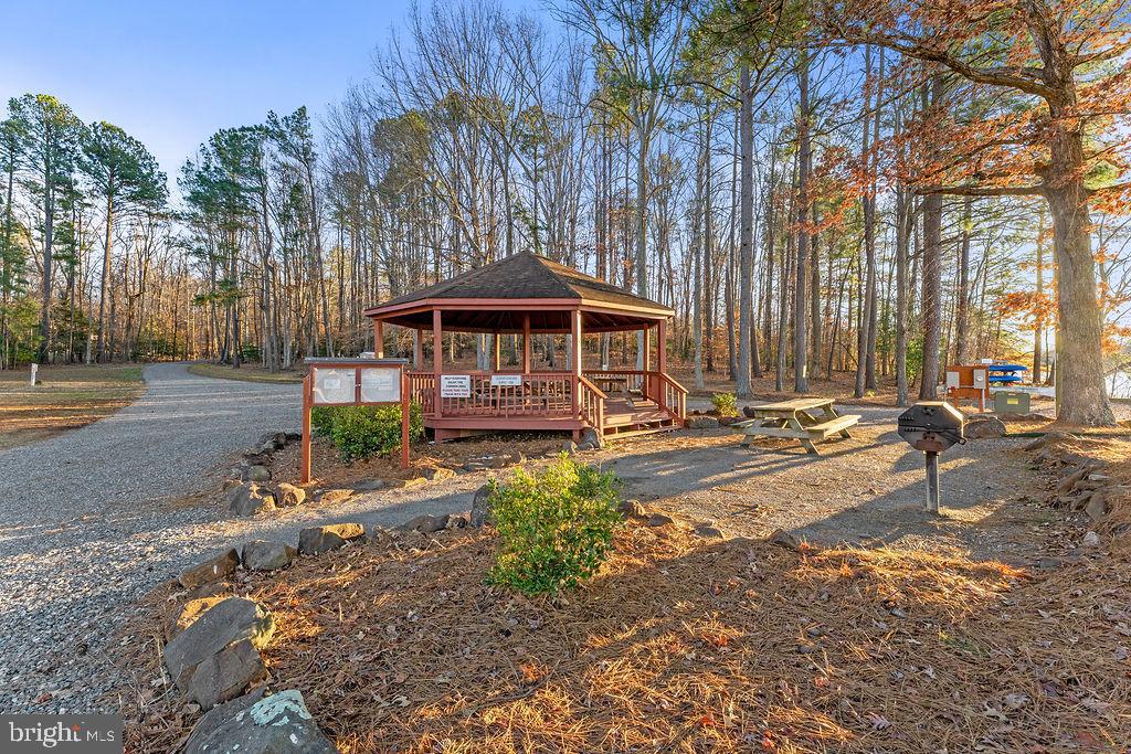 1339 Moody Town Road Bumpass, VA 23024 - Photo 48 of 63 a view of a house with backyard and sitting area
