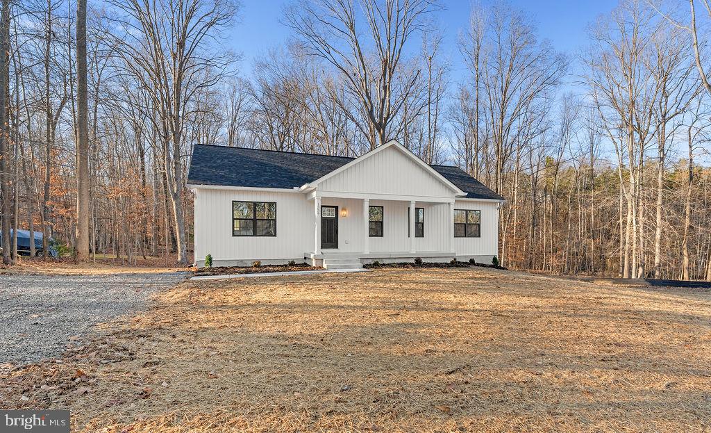 1339 Moody Town Road Bumpass, VA 23024 - Photo 54 of 63 a front view of a house with a yard