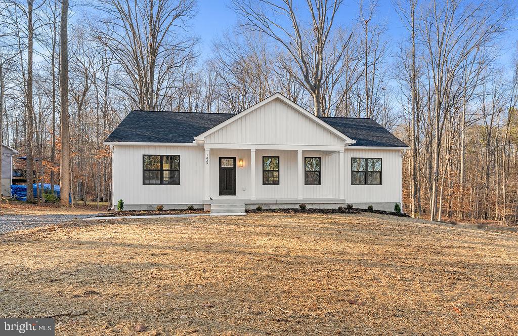 1339 Moody Town Road Bumpass, VA 23024 - Photo 56 of 63 a front view of a house with a yard