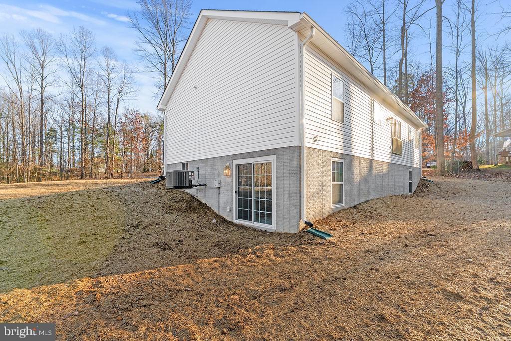 1339 Moody Town Road Bumpass, VA 23024 - Photo 63 of 63 a view of a house with a yard