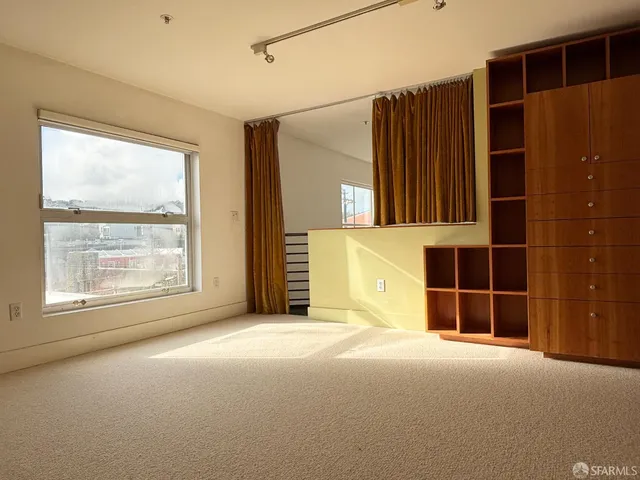 an empty room with windows