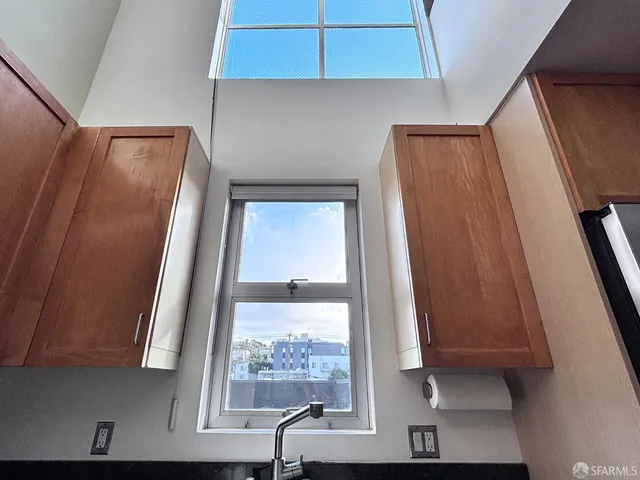 a view of front door with a chair