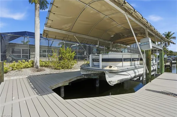 a view of balcony with wooden floor and outdoor space