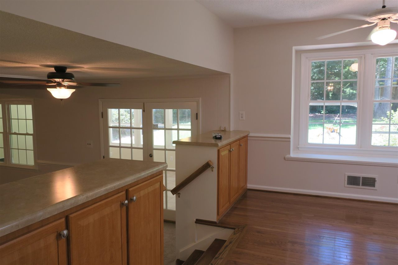 7509 Gala Court Raleigh, NC 27615 - Photo 9 of 18 Kitchen Cabinet with a view of Bench Seat / Nook area