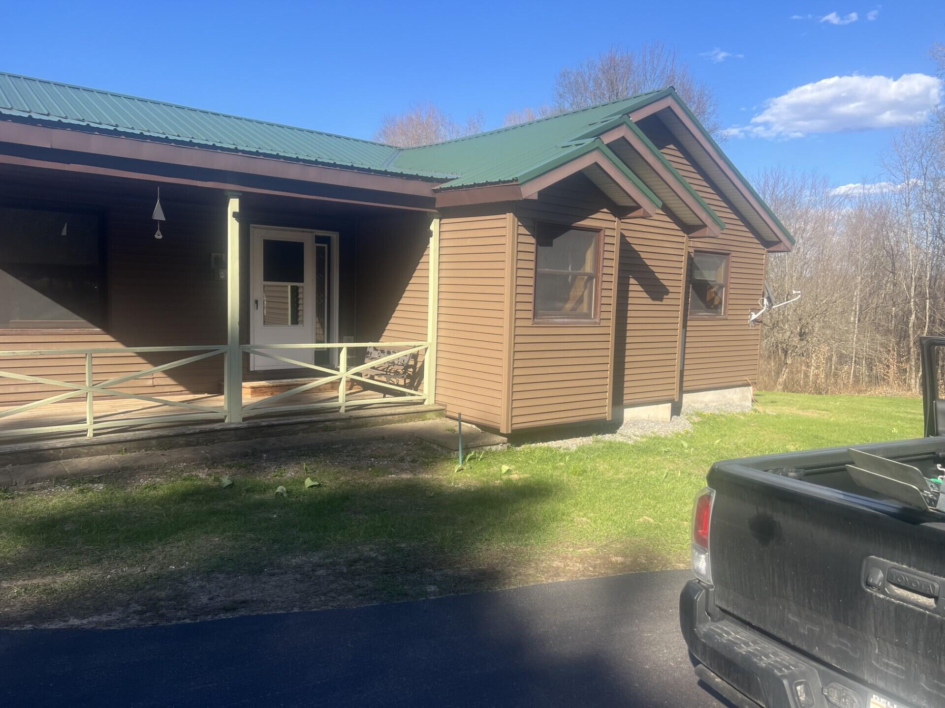 243 County Rte 14 St. Regis Falls, NY 12980 - Photo 2 of 55 Front