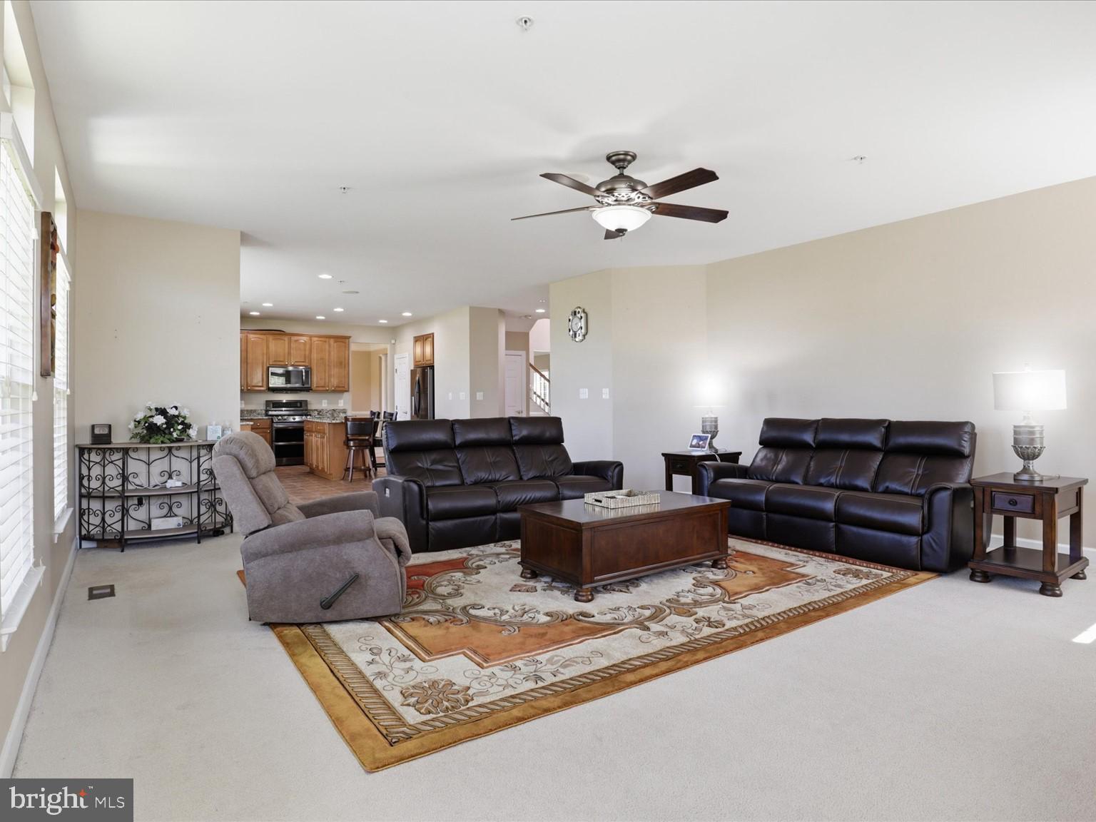 14202 Derby Ridge Road Bowie, MD 20721 - Photo 22 of 57 CEILING FAN AND LIGHT IN FAMILY ROOM