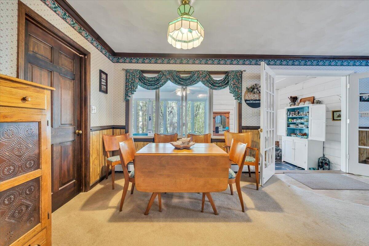 3878 Harborwood Road Salem, VA 24153 - Photo 16 of 60 a view of a dining room with furniture window and wooden floor