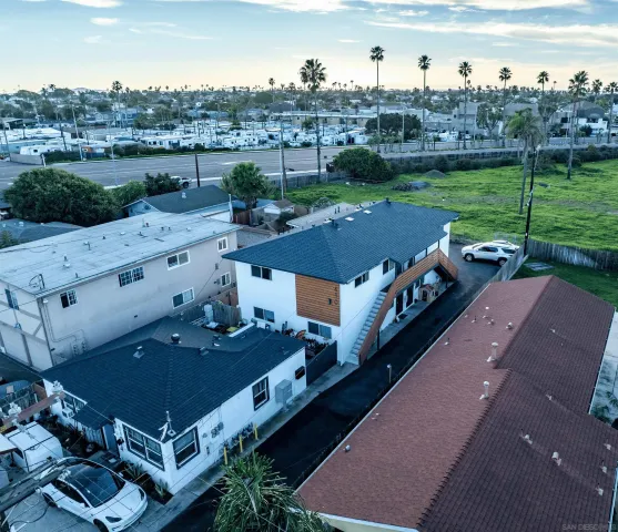 an aerial view of a house with a garden