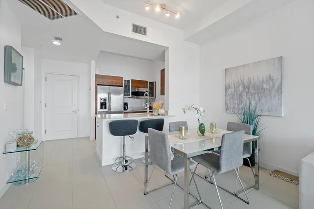 a view of a dining room with furniture
