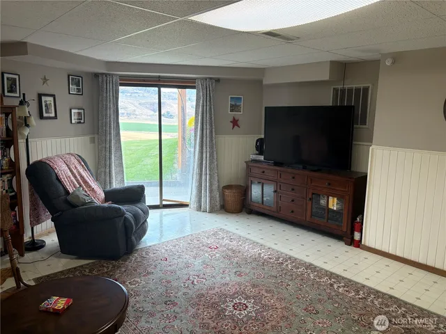 a bathroom with a sink toilet and a mirror