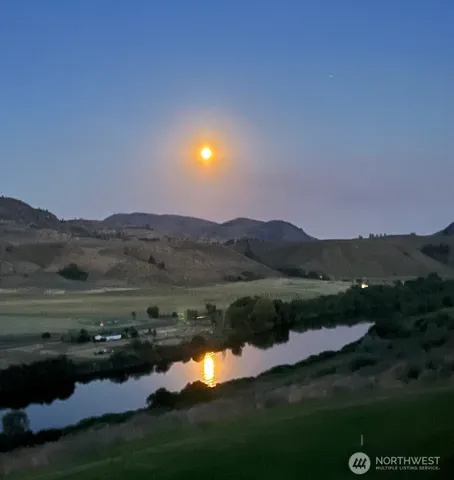 a view of a lake from a balcony
