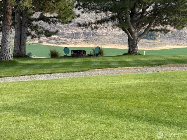a view of a balcony with chairs