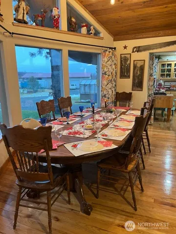 a view of a patio with table and chairs